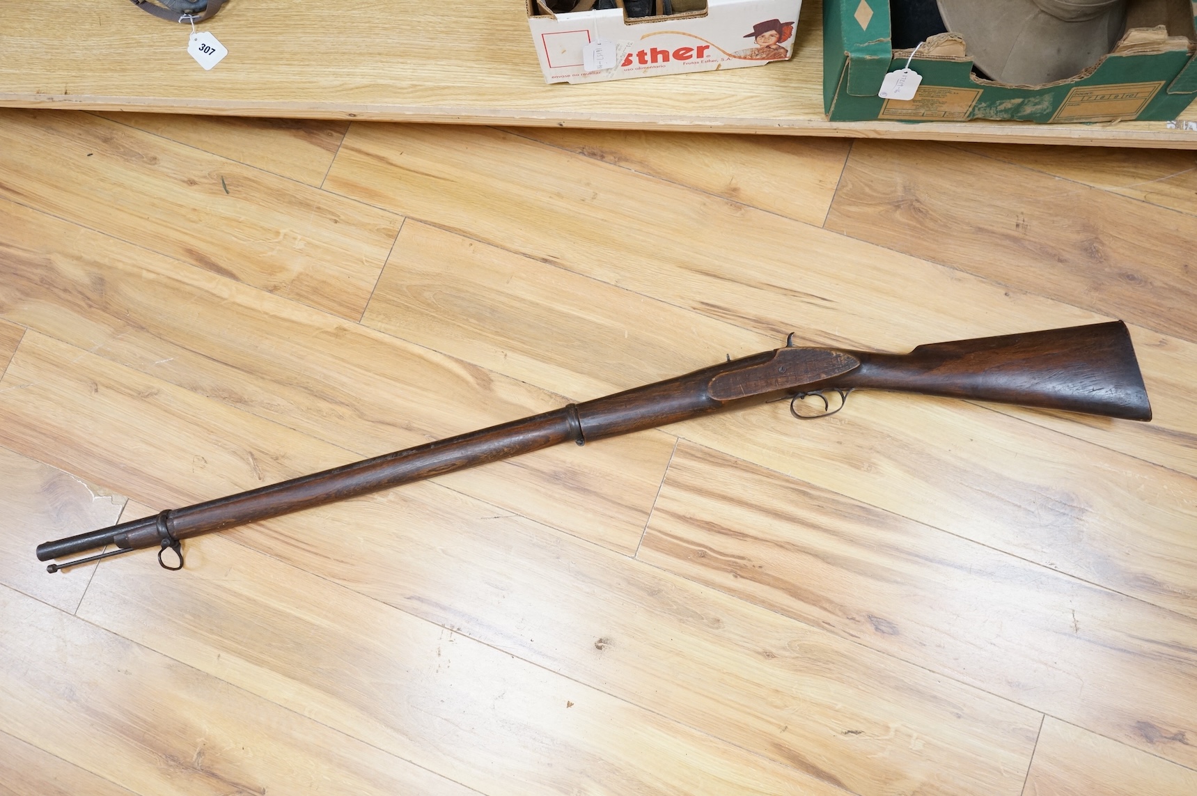 An Indian military style percussion musket, barrel 96cm, the overall length 135cm, with military style mounts and lock, although the barrel has some age the stock and furniture is later